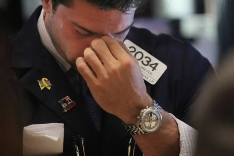 Falta de medidas para estimular a recuperação dos EUA decepcionou investidores (Mario Tama/Getty Images)
