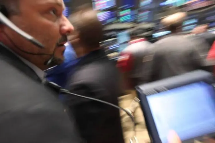 
	Operadores da NYSE: receita l&iacute;quida para o trimestre caiu 0,2 por cento, para 600 milh&otilde;es de d&oacute;lares
 (Mario Tama/ Getty Images)