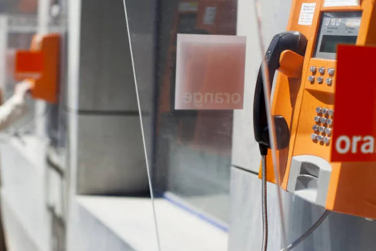 Orange: a Drei se recusou a dizer o quanto foi gasto na sua "massiva" campanha de marketing com o slogan "Há uma alternativa" (Bartek Sadowski/Bloomberg)
