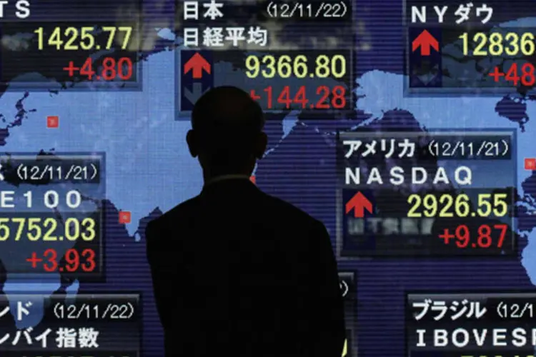 
	Bolsa de valores de T&oacute;quio: o &iacute;ndice Nikkei, do Jap&atilde;o, marcava 12.430,61 pontos no in&iacute;cio das negocia&ccedil;&otilde;es
 (Kim Kyung-Hoon/Reuters)