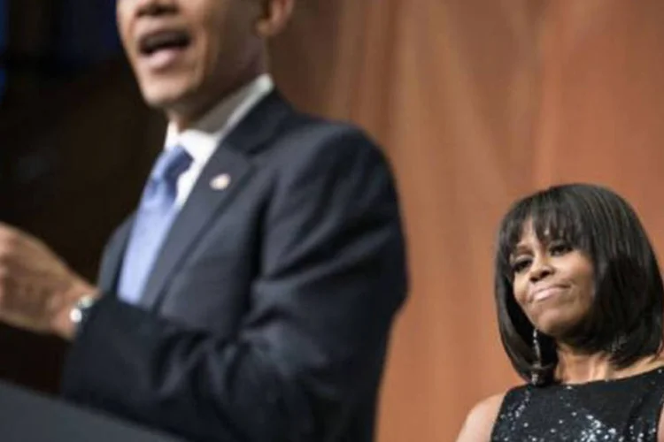 
	Barack e Michelle Obama: o presidente americano e sua esposa almo&ccedil;ar&atilde;o no Capit&oacute;lio ap&oacute;s a cerim&ocirc;nia, com centenas de convidado
 (AFP)