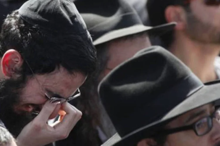 Os enterros causaram comoção em Israel
 (Gali Tibbon/AFP)