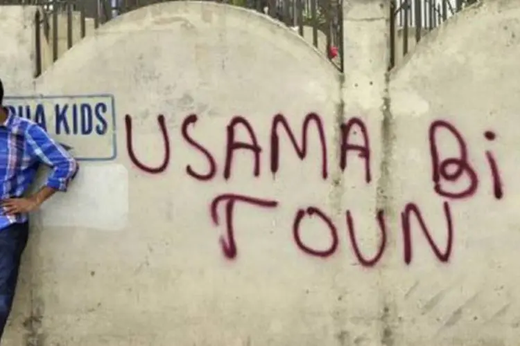 Parede pichada com os dizeres 'Cidade de Osama' nos arredores do esconderijo onde o Bin Laden foi morto (Aamir Qureshi/AFP)