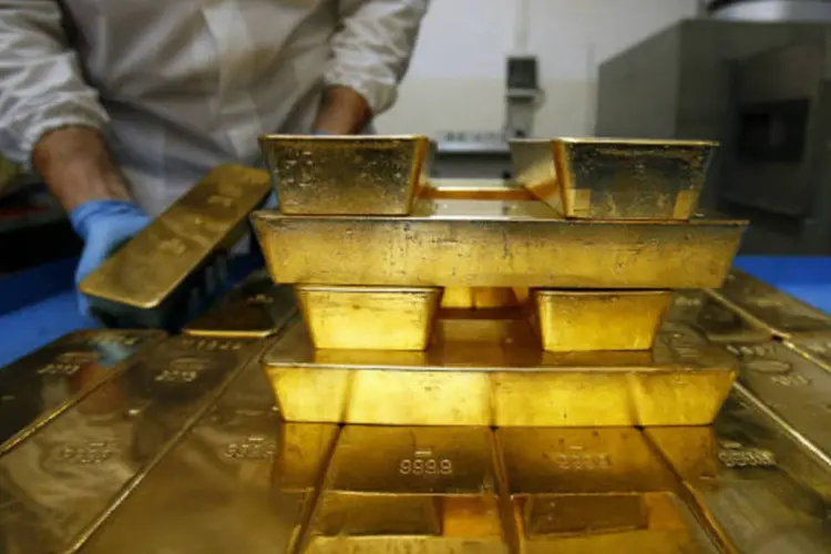 
	Barras de ouro: contrato de ouro mais negociado, com entrega para dezembro, teve queda de US$ 16,80 (1,2%), fechando a US$ 1.396,10 a on&ccedil;a-troy
 (Alessia Pierdomenico/Bloomberg)