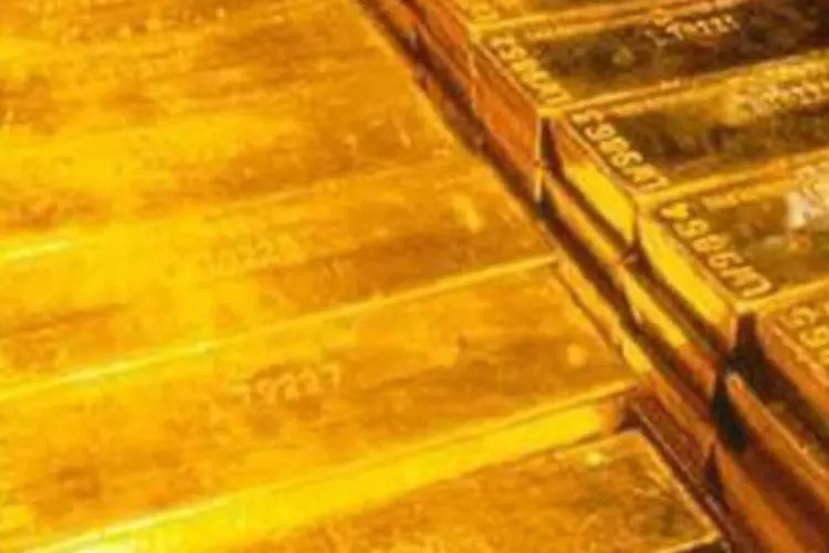 
	Barras de ouro: medidas passadas de relaxamento monet&aacute;rio levaram o ouro a atingir m&aacute;ximas recordes
 (AFP)