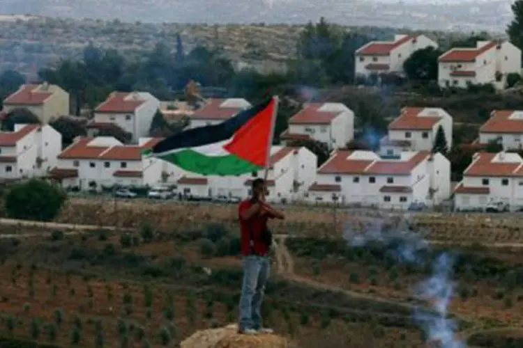 A decisão foi reprovada por integrantes do partido pacifista Meretz, segundo qual, um novo assentamento "supõe mais um cravo no caixão do processo de paz"
 (Abbas Momani/AFP)