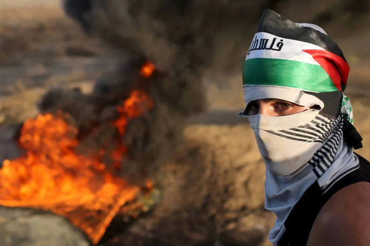 
	Oriente M&eacute;dio: o projeto franc&ecirc;s &eacute; organizar at&eacute; o fim do ano uma confer&ecirc;ncia de paz internacional
 (Reuters / Ibraheem Abu Mustafa)