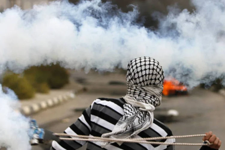
	Protestos na Cisjord&acirc;nia: cerca de 500 mil israelenses e 2,5 milh&otilde;es de palestinos vivem na Cisjord&acirc;nia e em Jerusal&eacute;m Oriental
 (Mohamad Torokman/Reuters)