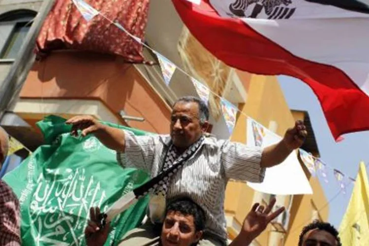Para especialistas, movimento islamita está mais isolado e enfraquecido do que antes de se reconciliar com o presidente palestino (Said Jatib/AFP)