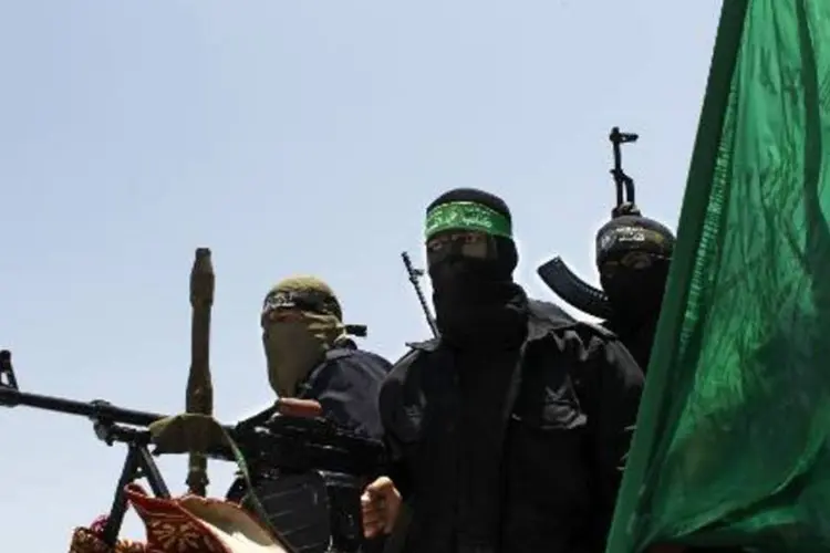 
	Militantes do Hamas: for&ccedil;a a&eacute;rea atacou 34 locais, na maioria pertencentes ao Hamas
 (Said Khatib/AFP)