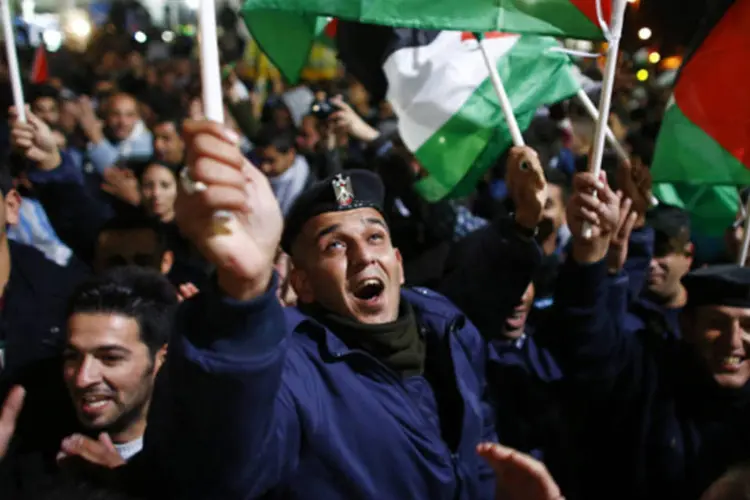 
	Palestinos comemoram o reconhecimento impl&iacute;cito do Estado palestino na Cisjord&acirc;nia: medida israelense desafia conquista na ONU
 (Marko Djurica/Reuters)