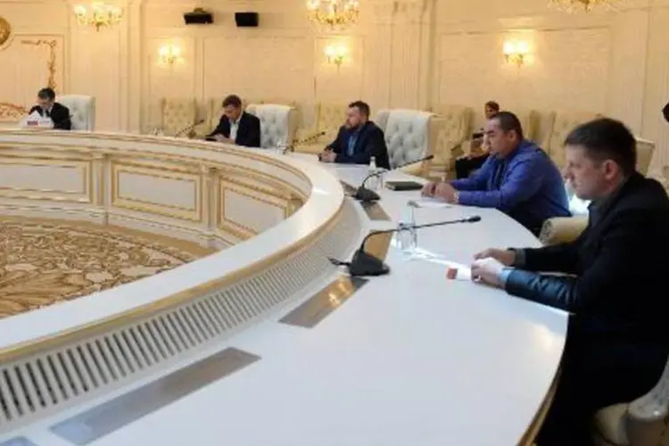 Negociações de paz entre representantes do governo e dos rebeldes da Ucrânia em Minsk, em Belarus (Vasily Maximov/AFP)
