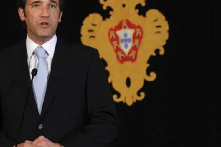 O primeiro-ministro Pedro Passos Coelho: a dívida portuguesa está sob tensão no mercado secundário, onde se negociam os títulos já emitidos (Francisco Leong/AFP)