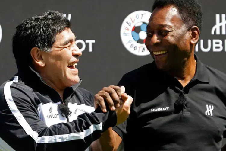 
	Pel&eacute; e Maradona: desde que Maradona surgiu para o futebol mundial, argentinos e brasileiros divergem sobre quem foi o melhor da hist&oacute;ria
 (Charles Platiau / Reuters)