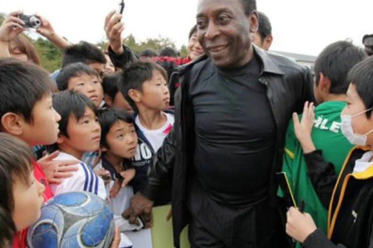 Pelé: "eu vim para trazer palavras de encorajamento, como um representante do povo brasileiro" (Jiji Press/AFP)