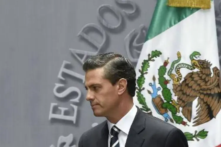 O presidente do México, Enrique Peña Nieto, faz pronunciamento em 6 de outubro de 2014 (Ronaldo Schemidt/AFP)