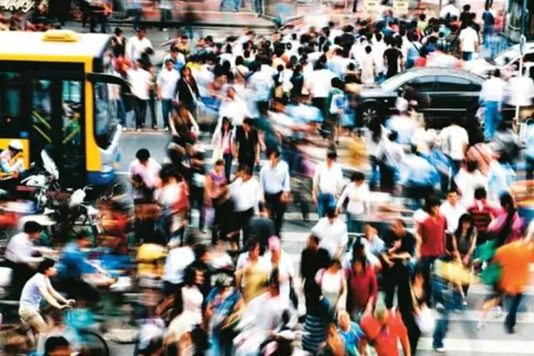 Movimento de pessoas em Pequim: até o final do século, a população mundial deve passar de 10 bilhões (Gideon Mendel/Corbis/Latin Stock)