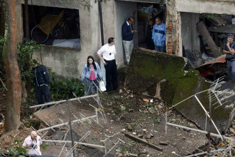 
	Destro&ccedil;os do acidente em Santos: crian&ccedil;a de 1 ano ferida no acidente deixou o hospital hoje (14)
 (REUTERS/Paulo Whitaker)