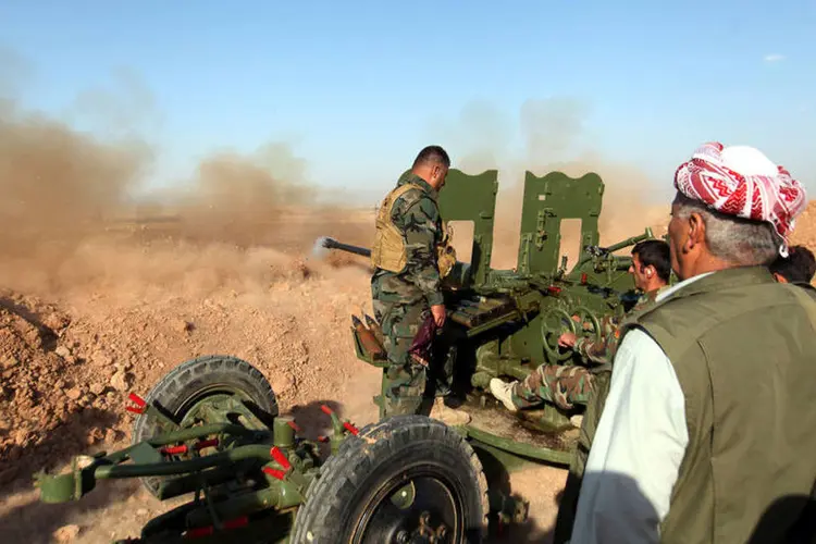 
	Peshmerga: eles conseguiram tomar o controle de uma zona de 120 m&sup2;, perto da estrada principal entre Mossul, o principal reduto da EI no Iraque
 (Azad Lashkari / Reuters)