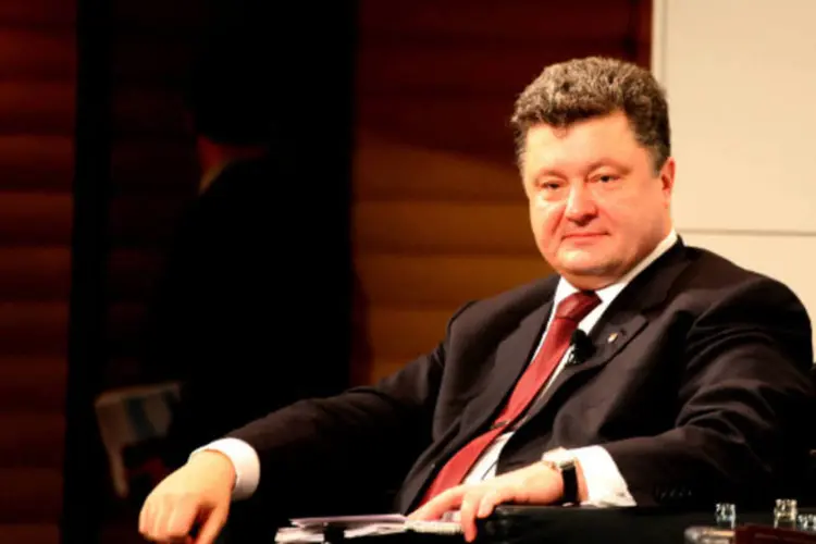 
	Petro Poroshenko: ex-ministro da Economia, de 48 anos, Poroshenko foi um dos financiadores das manifesta&ccedil;&otilde;es que derrubaram o presidente Viktor Yanukovytch em 22 de fevereiro
 (www.securityconference.de/Wikimedia Commons)