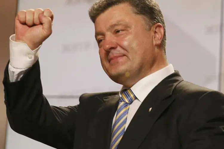 
	Petro Poroshenko: presidente disse que neste inverno &quot;a Ucr&acirc;nia ter&aacute; g&aacute;s, e ter&aacute; calefa&ccedil;&atilde;o&quot; gra&ccedil;as a um acordo sobre o pre&ccedil;o provis&oacute;rio do g&aacute;s russo
 (Gleb Garanich/Reuters)