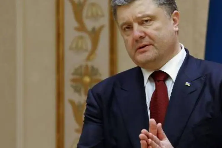
	O presidente da Ucr&acirc;nia, Petro Poroshenko: &quot;A descarada agress&atilde;o russa &eacute; uma amea&ccedil;a n&atilde;o s&oacute; para a Ucr&acirc;nia, mas para todo o mundo civilizado, sua seguran&ccedil;a e estabilidade&quot;
 (Sergei Gapon/AFP)