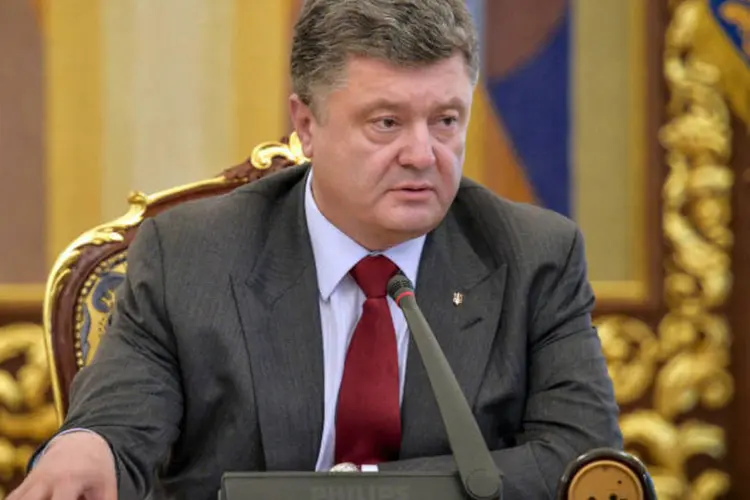 
	Petro Poroshenko: &quot;Pedimos que levem os guerrilheiros da Ucr&acirc;nia. Tenho certeza que conseguiremos&quot;
 (Mykola Lazarenko/Pool/Reuters)