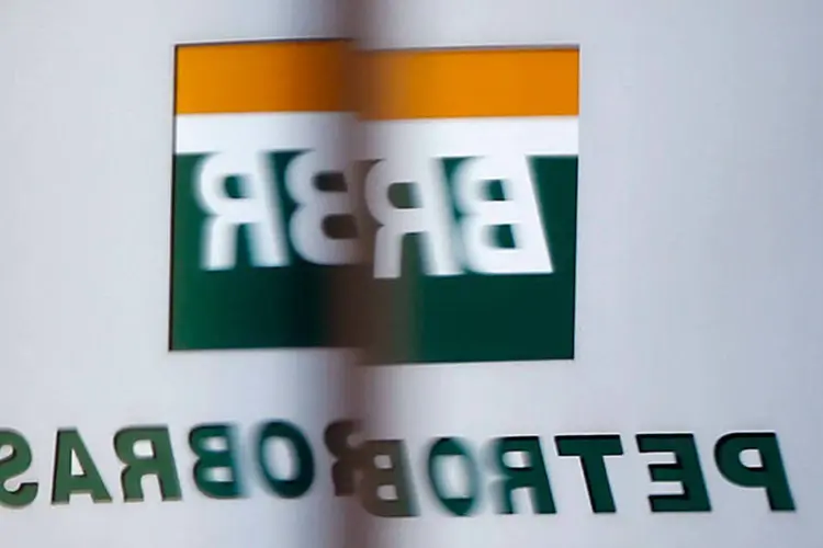 
	Logo da Petrobras: segundo a ag&ecirc;ncia de classifica&ccedil;&atilde;o de risco, a divulga&ccedil;&atilde;o do balan&ccedil;o antes do final de abril j&aacute; estava incorporada em seu cen&aacute;rio base
 (REUTERS/Paulo Whitaker)