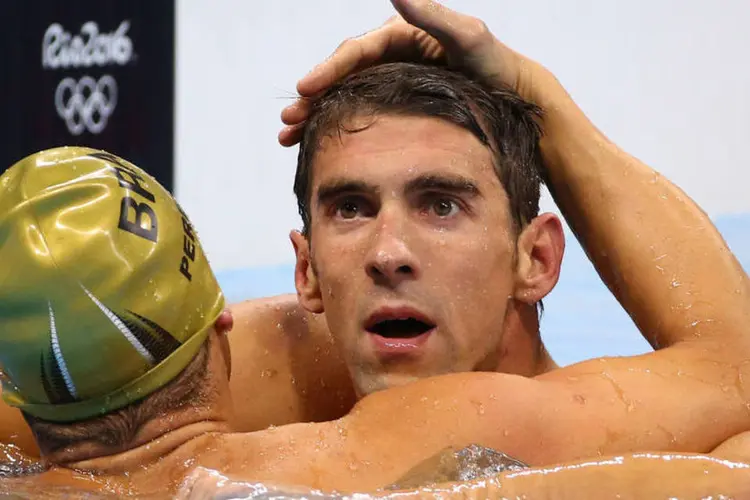 
	Phelps e Pereira: Phelps, que j&aacute; avisou que n&atilde;o estar&aacute; nos Jogos de 2020, em T&oacute;quio, conquistou o tetracampeonato
 (David Gray / Reuters)