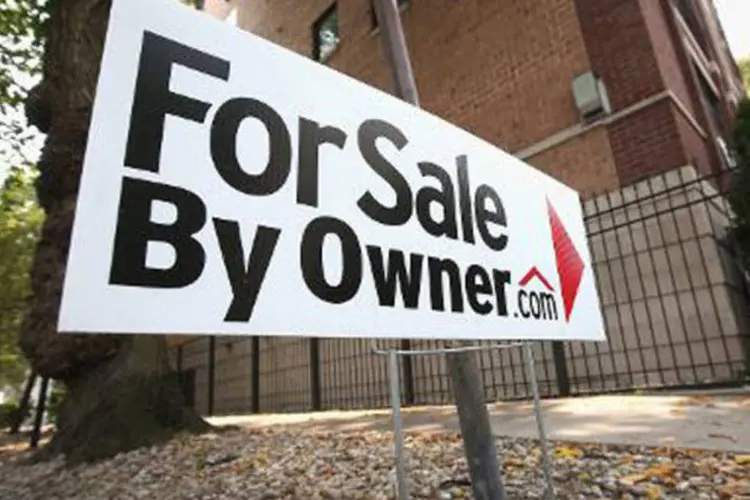 
	Casa &agrave; venda: vendas aumentaram 6,4%, para taxa anual de 433 mil unidades
 (Scott Olson/AFP)