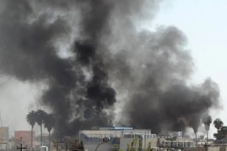 
	Fuma&ccedil;a &eacute; vista ap&oacute;s ataques no Iraque: o&nbsp;pior atentado causou a morte de quatro peregrinos xiitas
 (Getty Images)