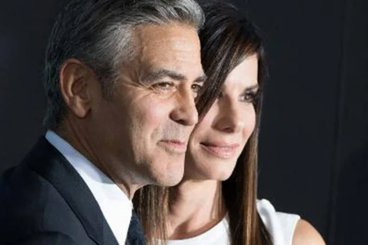 George Clooney and Sandra Bullock participam do lançamento do filme "Gravidade": filme estreia nesta sexta nos Estados Unidos e na próxima semana no Brasil (Dave Kotinsky/AFP)