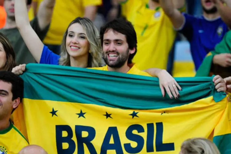 
	Torcedores no est&aacute;dio do Maracan&atilde;, na Copa das Confedera&ccedil;&otilde;es:&nbsp;&quot;sempre estamos preocupados com essa possibilidade&quot;, disse&nbsp;diretor de marketing da Fifa
 (Tânia Rêgo/ABr)