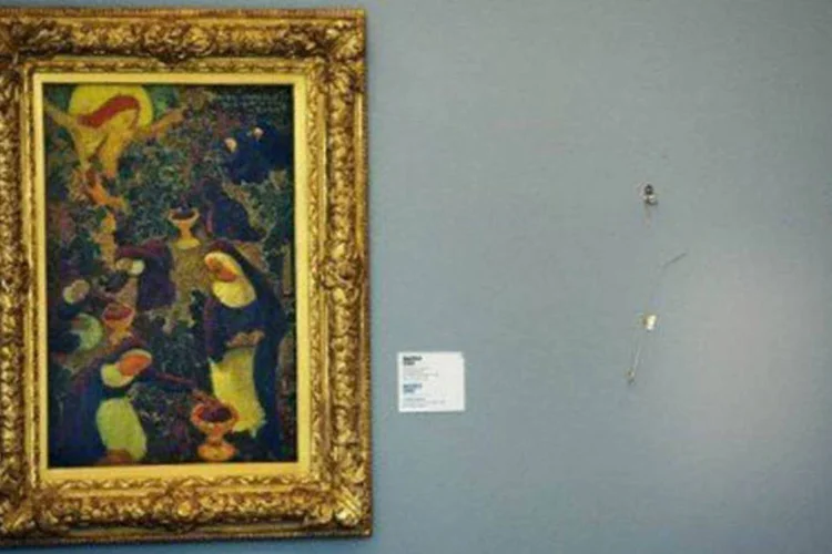 
	Espa&ccedil;o vazio no lugar em que estava uma das pinturas roubadas: acreditava-se que pelo menos algumas pinturas teriam sido destru&iacute;das pelo fogo
 (Robin Utrecht/AFP)
