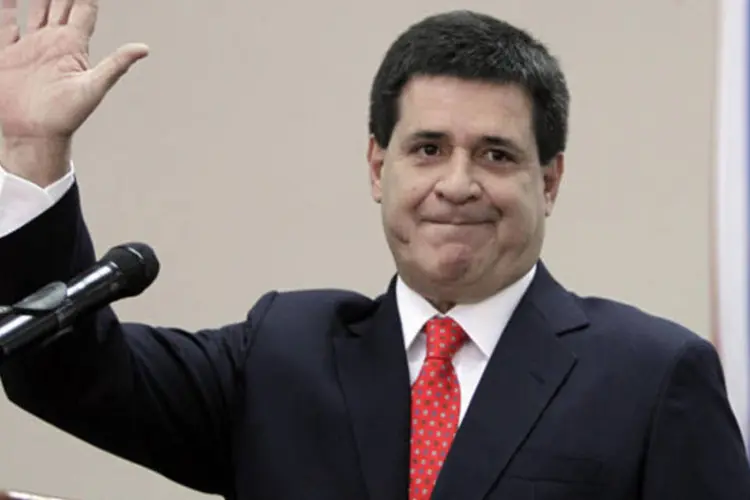 
	Horacio Cartes, presidente do Paraguai: Lewandowski relatou a Cartes como funciona o Poder Judici&aacute;rio brasileiro e defendeu interc&acirc;mbio entre magistrados dos dois pa&iacute;ses
 (Jorge Adorno/Reuters)