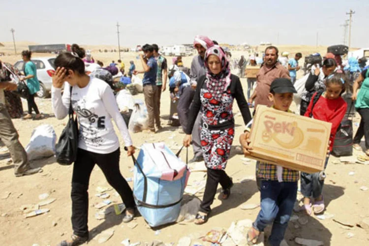 
	Refugiados s&iacute;rios:&nbsp;decis&atilde;o foi tomada depois que a oposi&ccedil;&atilde;o pressionou o governo de David Cameron a aceitar cidad&atilde;os s&iacute;rios afetados pelo conflito
 (Azad Lashkari/Reuters)