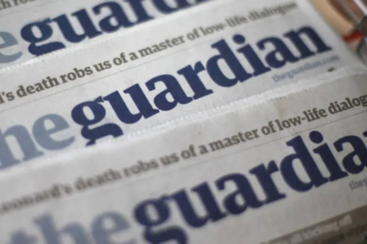 
	C&oacute;pias do jornal The Guardian: &nbsp;editor do jornal ser&aacute; interrogado no pr&oacute;ximo m&ecirc;s sobre os arquivos secretos do espi&atilde;o Edward Snowden
 (Suzanne Plunkett/Reuters)