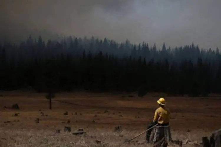 
	&quot;Rim Fire&quot;: &nbsp;inc&ecirc;ndio se transformou no quinto maior da hist&oacute;ria da Calif&oacute;rnia e queimou 81.700 hectares de mata da Sierra Nevada, no centro de estado
 (Justin Sullivan/AFP)
