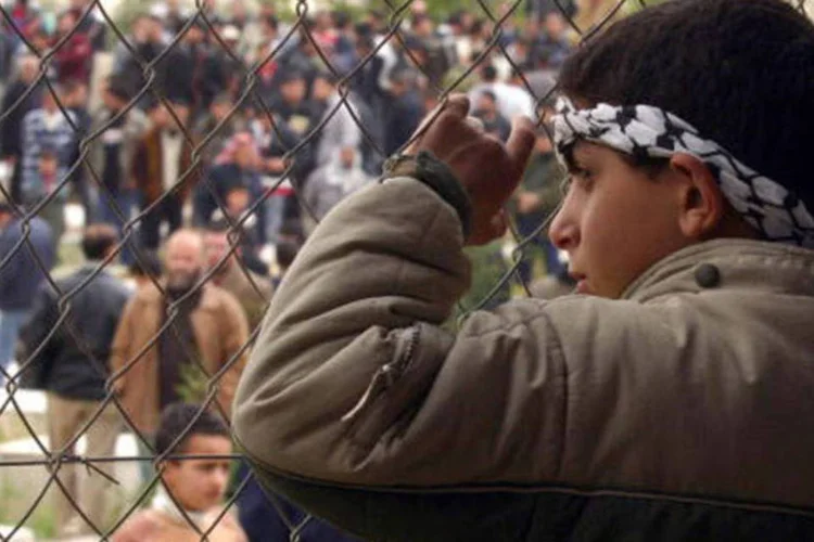 Menino em campo de refugiados de Kalandia: palestinos suspenderam duas reuniões de paz  com israelenses (Getty Images)