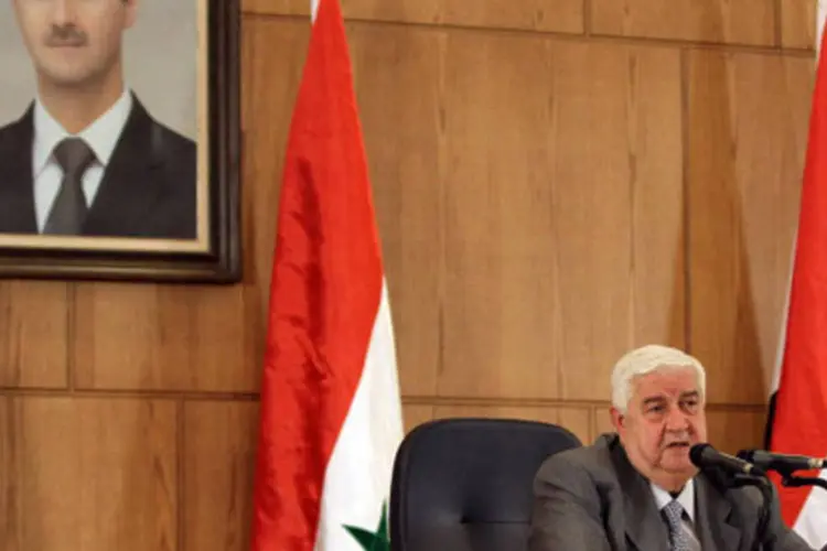 O ministro sírio de Relações Exteriores, Walid al Muallem: "o pretexto das armas químicas é falso e infundado. Desafio a que apresentem qualquer prova", disse (Getty Images)