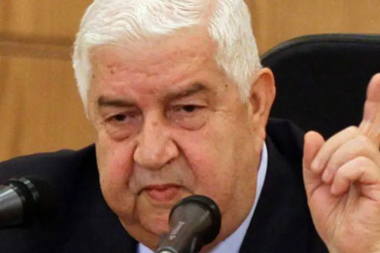 O ministro das Relações Exteriores da Síria, Walid Muallem: "se acreditam que assim poderão impedir a vitória de nossas Forças Armadas se enganam", disse (Louai Beshara/AFP)