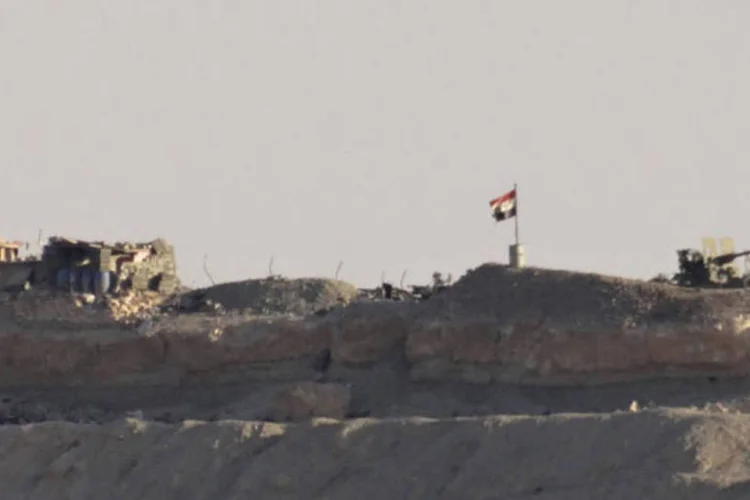 
	Base militar na S&iacute;ria: esta &eacute; a primeira vez que um funcion&aacute;rio de alto escal&atilde;o do governo s&iacute;rio confirma a posse de armas qu&iacute;micas pelo pa&iacute;s
 (Ayman Alderi/Reuters)