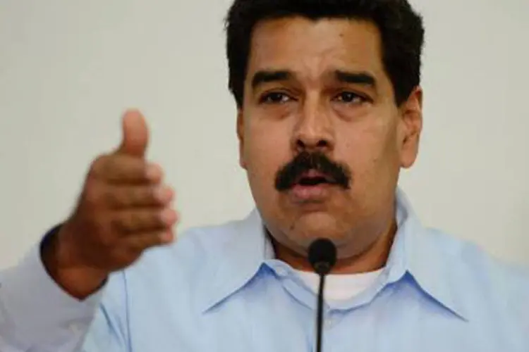 
	Nicol&aacute;s Maduro:&nbsp;&quot;a&nbsp;tarefa principal deste segundo ano &eacute; o trabalho pelo crescimento econ&ocirc;mico, o desenvolvimento econ&ocirc;mico real, a prosperidade econ&ocirc;mica&quot;
 (Leo Ramirez/AFP)