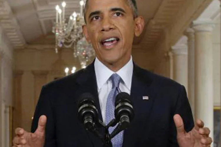 O presidente americano Barack Obama: "o que ocorreu com esta gente não foi apenas uma violação da lei internacional, mas também uma ameaça à nossa segurança", disse (Evan Vucci/AFP)