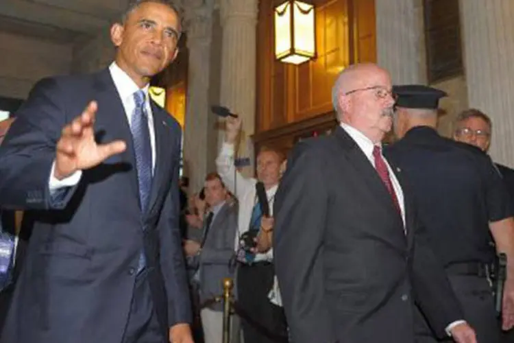 O presidente americano, Barack Obama (e), após discurso no congresso: Obama deu uma oportunidade à diplomacia (Mandel Ngan/AFP)