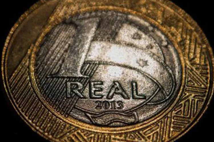 
	Moeda de um real:&nbsp;economia americana avan&ccedil;ou 0,7%, enquanto a Uni&atilde;o Europeia teve um aumento de 0,2% no PIB
 (Yasuyoshi Chiba/AFP)
