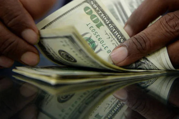 
	D&oacute;lar: &agrave;s 11:25, o d&oacute;lar recuava 0,30 por cento, a 3,1850 reais na venda, a moeda atingiu 3,1600 reais na m&iacute;nima do dia
 (Getty Images)