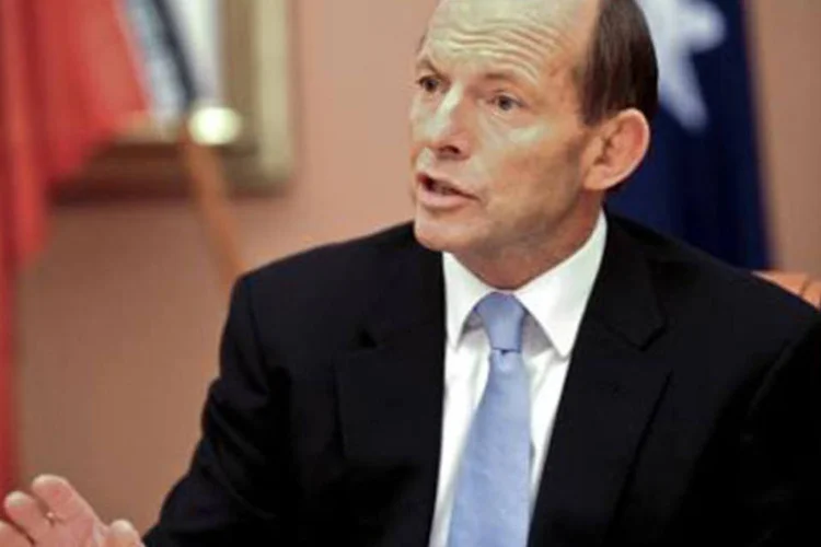 Primeiro-ministro australiano, Tony Abbott: Abbott chamou de "imbecilidade total" a atribuição do aquecimento global à atividade humana (Lukas Coch/AFP)