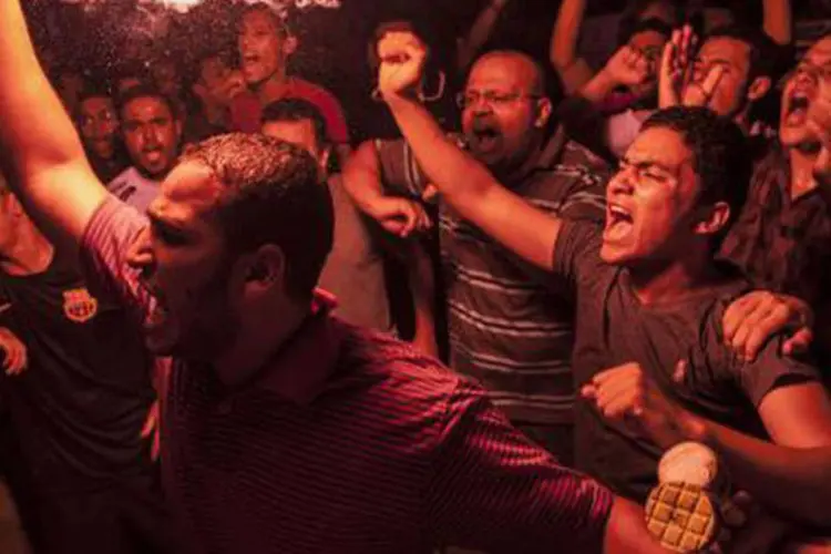 Membros da Irmandade Muçulmana: forças de segurança egípcias executam uma campanha de repressão contra os partidários de Mursi, que chamam de "terroristas" (Mahmoud Khaled/AFP)