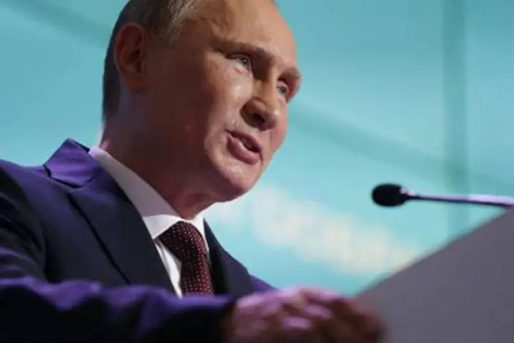 Vladimir Putin: "posso garantir 100% que seremos capazes de completar (o plano de desmantelamento das armas químicas sírias)", disse (Maxim Shipenkov/AFP)